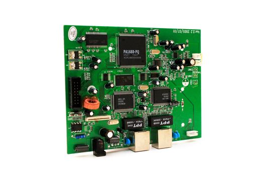 Green computer circuit board placed on white background