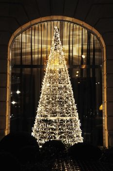 Modern Christmas tree made of LED garlands