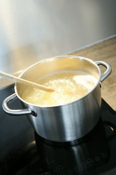 development of a recipe in a saucepan on the fire