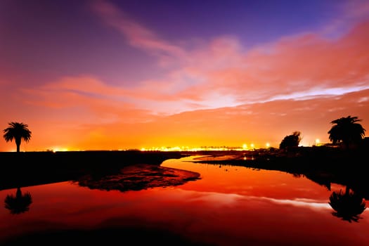 Reflexes of a winter sunset on the river Tejo.