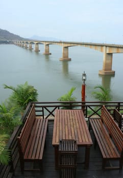 Dining table with view bridge and river