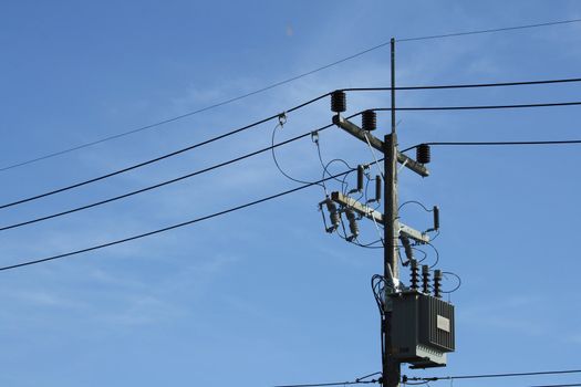 Electric Cable and wires against a blue sky