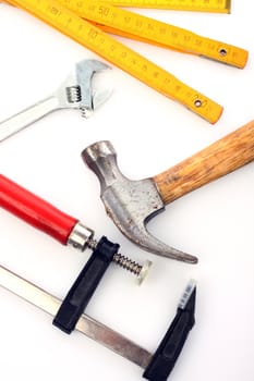 Close up of carpenter's tools over white