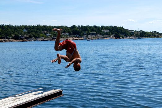 jumping into the sea. Please note: No negative use allowed.