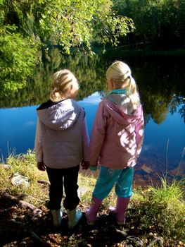 girls playing in the wild