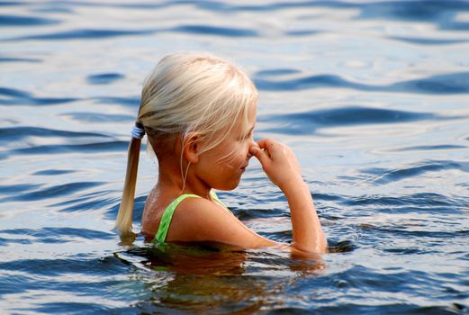 girl swimming. Please note: No negative use allowed.