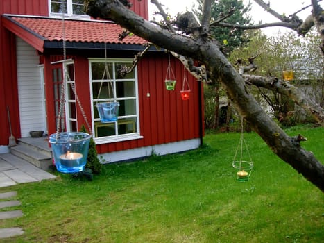 cup candles hanging on the tree. Please note: No negative use allowed.