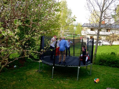 children playing on the trampoline. Please note: No negative use allowed.