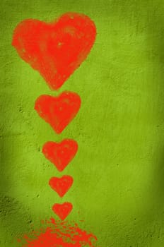 Red hearts on green background.