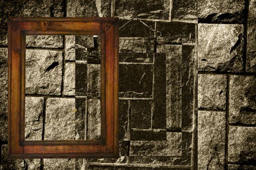 Old wooden frame in front of an old black and white stonewall.