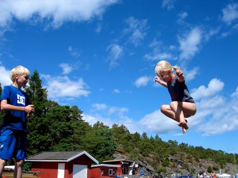 children playing on the trampoline. Please note: No negative use allowed.