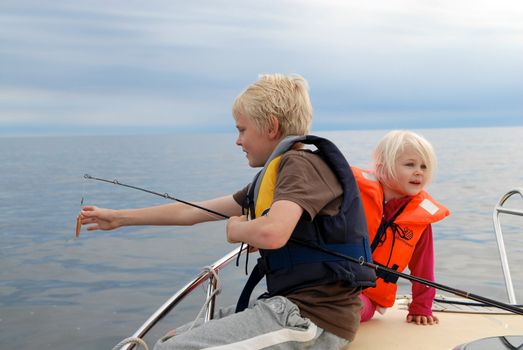 children fishing. Please note: No negative use allowed.