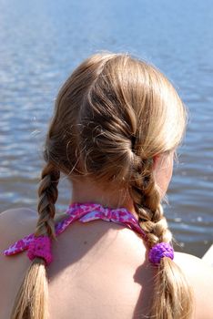 girl's back with swim suit. Please note: No negative use allowed.