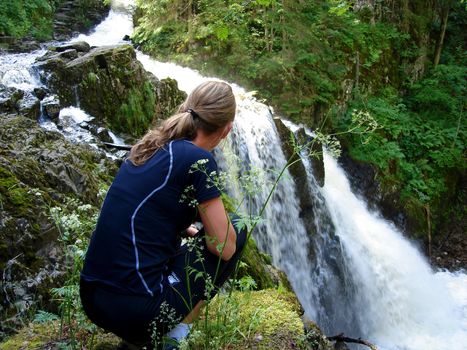 watching the waterfall. Please note: No negative use allowed.