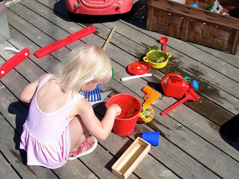 girl playing in the garden. Please note: No negative use allowed.