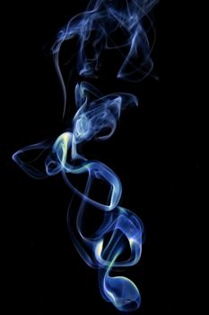 Abstract colored smoke isolated on black background