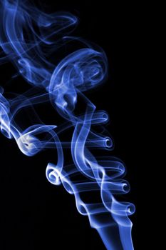 Abstract colored smoke isolated on black background