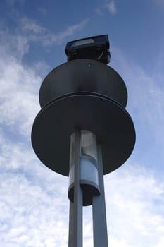 Street lamp against the blue sky 