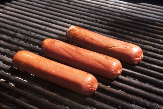 Hot dogs on a bbq