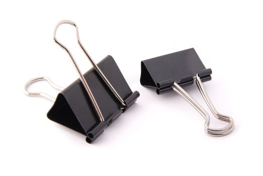 Binder clips for paper on a white background