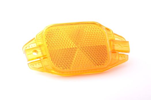 Bike reflector on white background