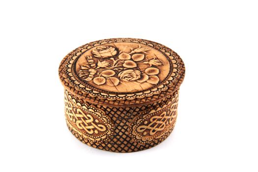 Small birch bark casket on white background 