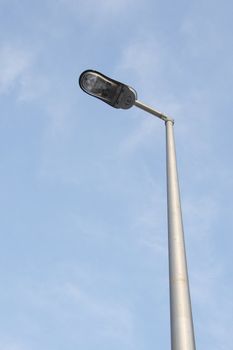 Street lamp against the blue sky 