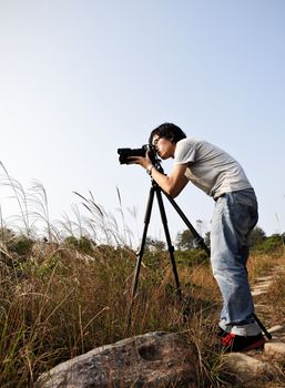 Photographer taking photo at wild