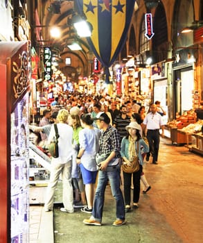 June 2011 Aisle scene in the Grand Bazaar Istanbul Turkey with shoppers at stalls