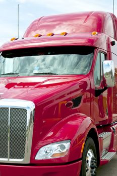 New red semi truck ready to go to work.