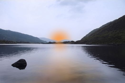 scenic view of a killarney lake at sunset