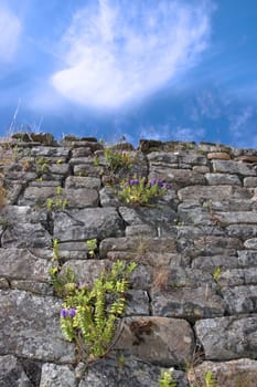 an irish old irish wall in Kerry on the west coast of Ireland with a sky background
