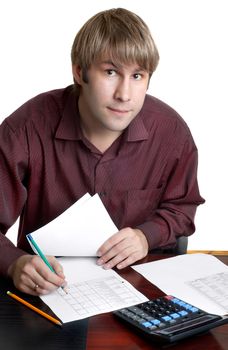 male accountatn accountant working with papers and calculator