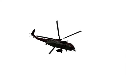 a helicopter on a life air sea rescue mission on a white background