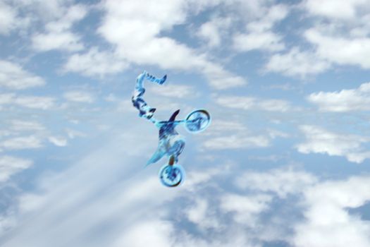 a motion blur of a stunt rider doing tricks on his motorbike against a cloudy sky