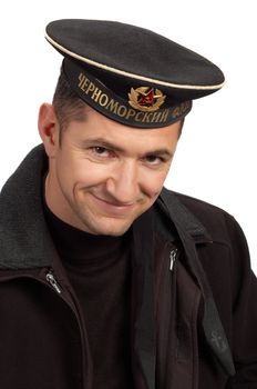 military sailor wearing uniform black cap and jacket