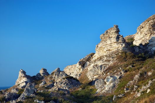surreal rock peaks on the sea coast. copy space. Trhankut, Crimea.