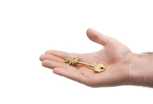big door key lying on man's palm