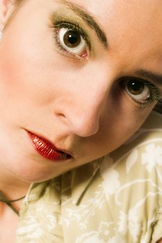 Studio portrait of a young woman looking concentrated