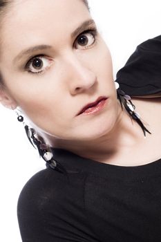 Studio portrait of a young woman looking angry