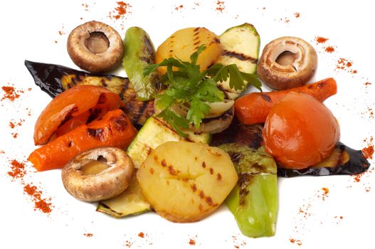 closeup of assorted grilled vegetables, isolated on white, selective focus