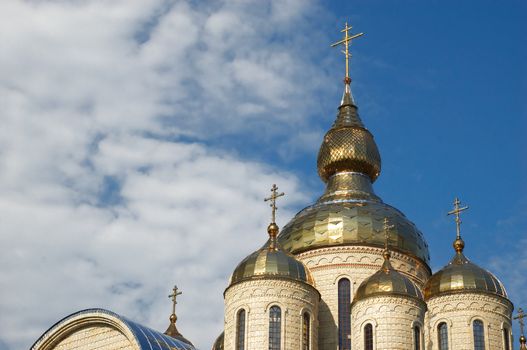 golden domes and crosses over russian or ukrainian church