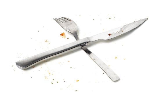 dirty unwashed fork and knife after eating