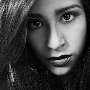 Studio portrait of a mixed race vietnamese girl being extremely beautiful