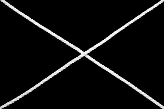 The letter "x" from a linen cord