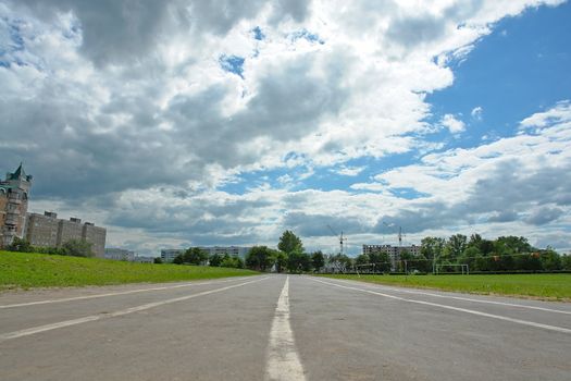 Racetrack on a background of the cloudy sky                               