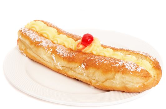 Custard filled donut with cherry on top