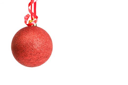Red Christmas bauble isolated on white background with copy space. 