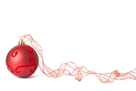 One red Christmas bauble with ribbon isolated on white background with copy space. 