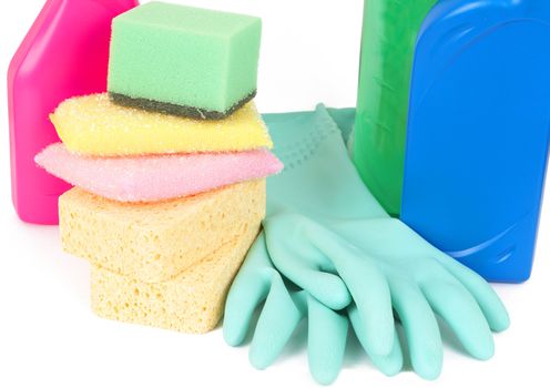 Variety of cleaning products such as sponges, gloves, and bottles with chemicals isolated on white background